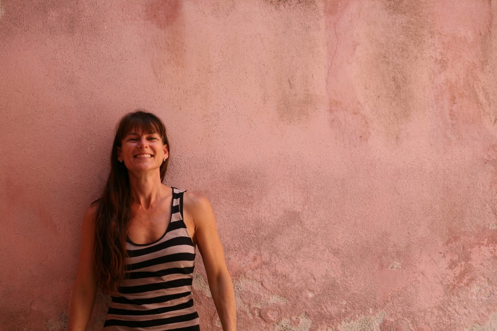 Tashi pink wall portrait cheeky grin - small