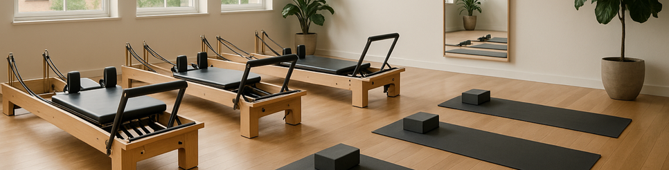 Bright, modern Cork studio space featuring Reformer Pilates machines and yoga mats with blocks, offering a clean, minimalist environment for movement, strength, and mindful practice