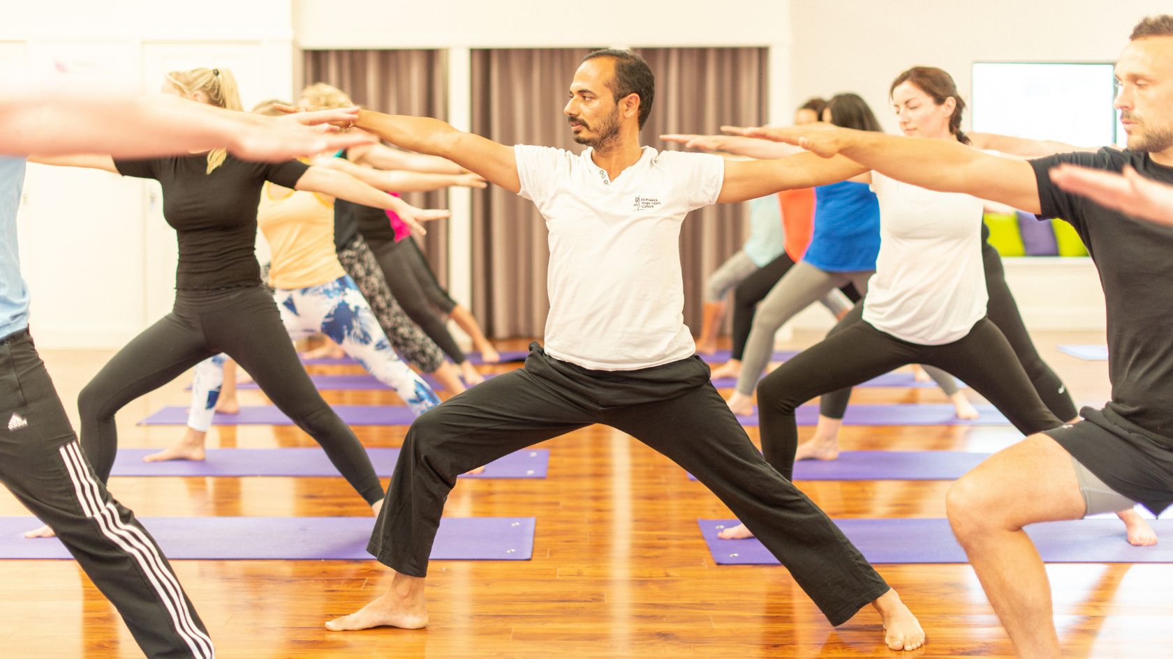 Mixed-level vinyasa yoga class at our Cork city studio