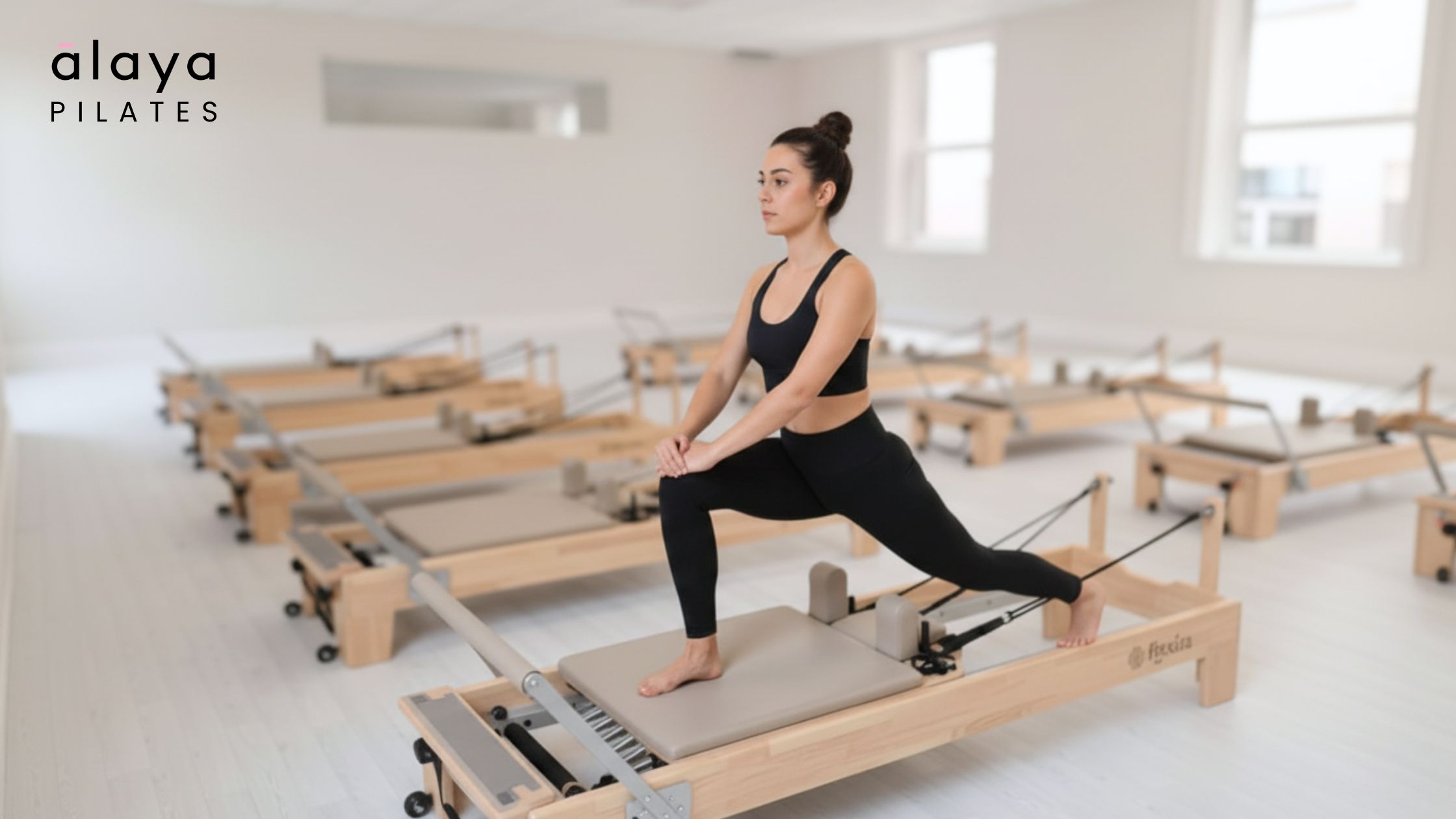 Woman doing Reformer Pilates exercise in Cork studio to support weight loss and strength